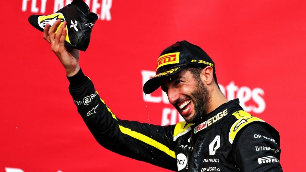 Daniel Ricciardo with a Shoey after finishing on the podium in Hungary 2020.