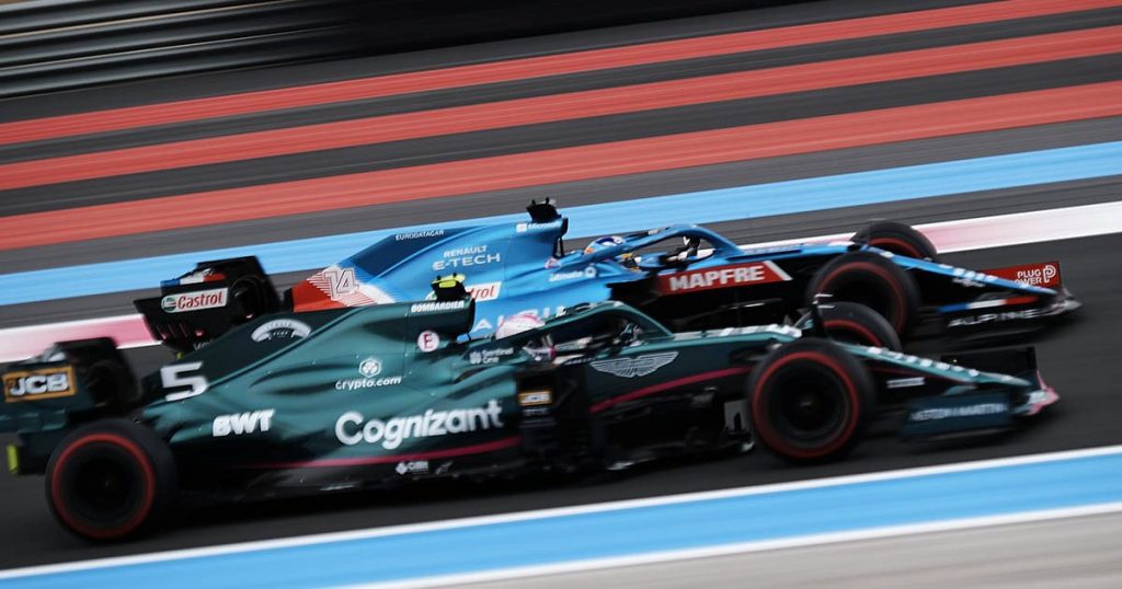 A Aston Martin and an Alpine side by side on track at Paul Ricard.