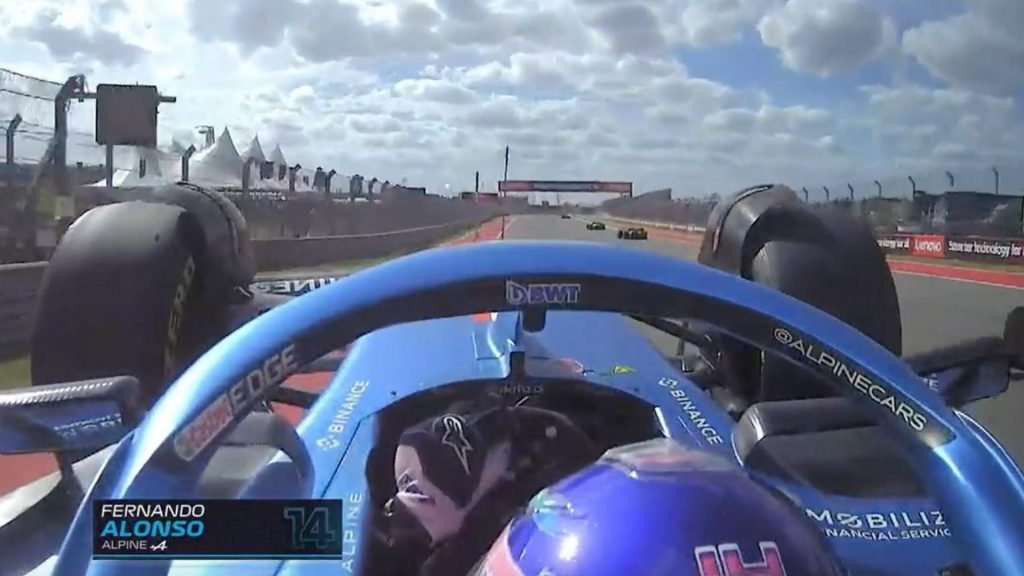 Fernando Alonso airborne after being hit by Lance Stroll.