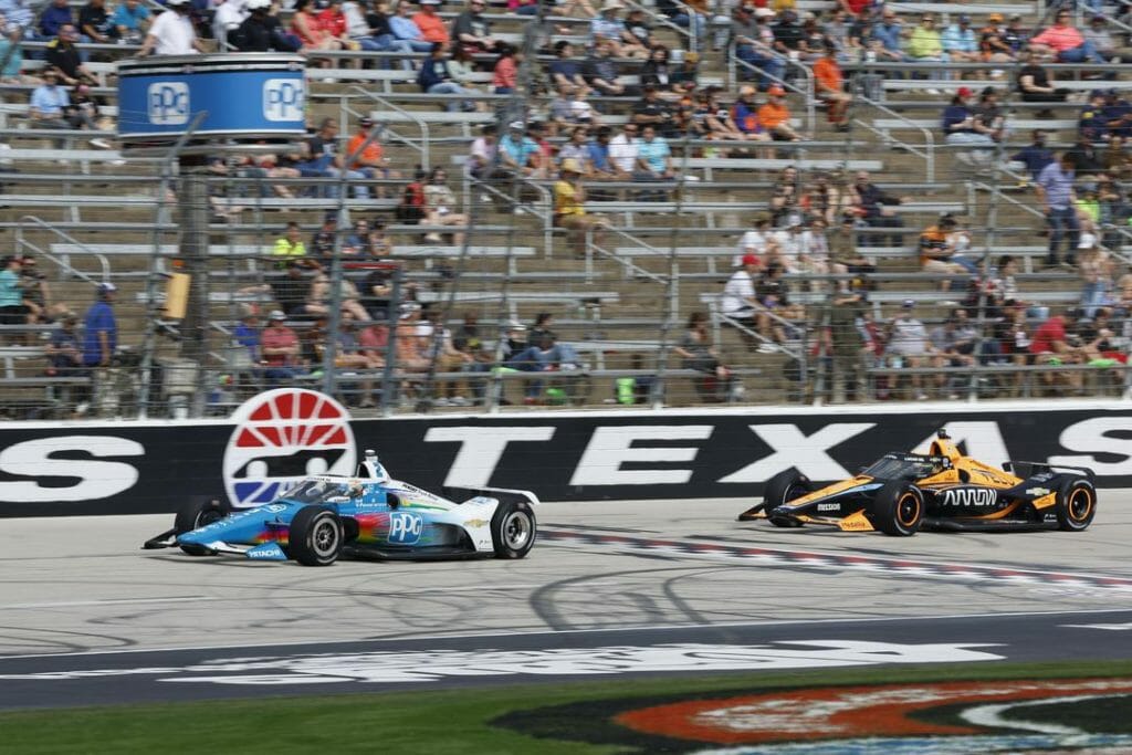 Josef Newgarden and Pato O'Ward following each other in Texas.